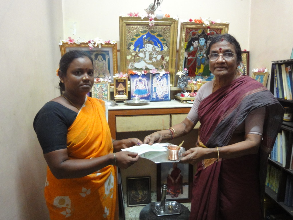 Mother of trustee, on behalf of Sriram Charitable Trust, provided educational aid to Abirami’s (a housemaid) children’s college annual fees.