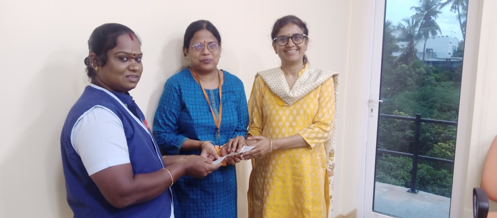 The Managing Trustee handed over an educational aid cheque to a housekeeping woman, supporting her daughter’s Bachelor of Vocational Degree course on operation theatre