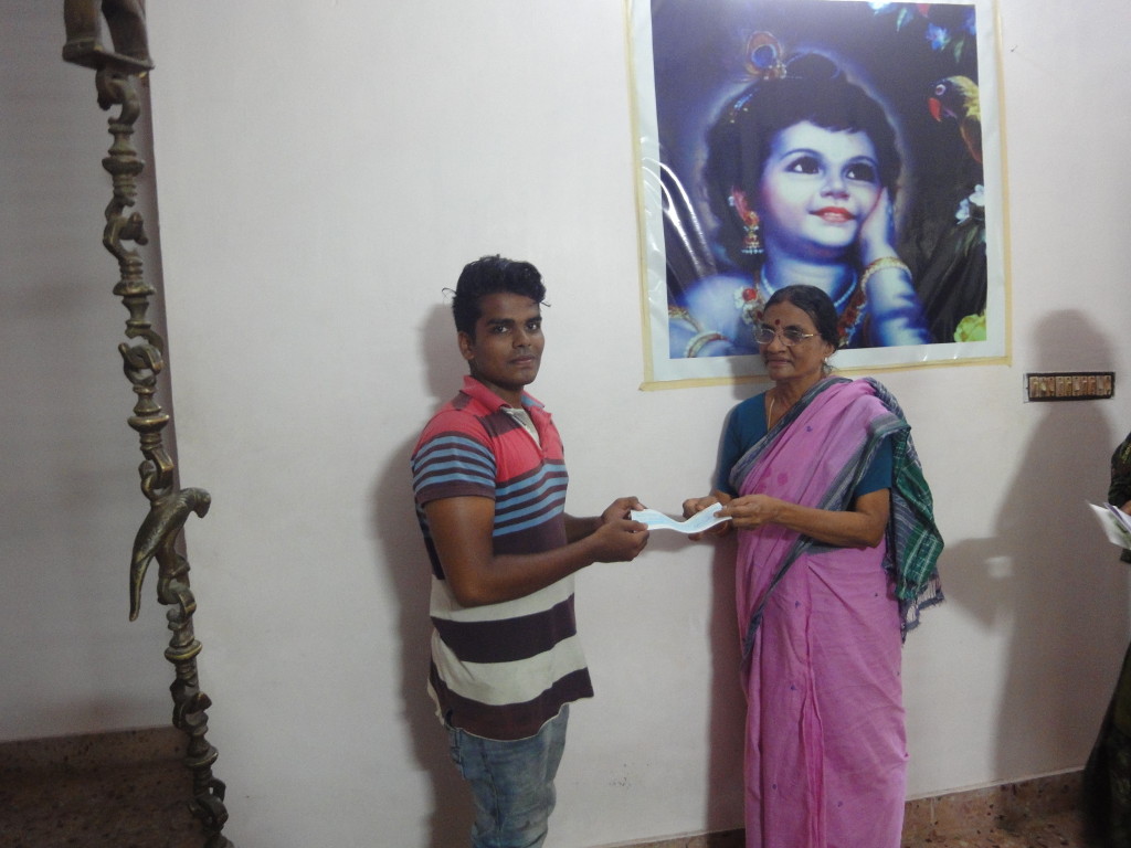 The parents of Trustee had handed over an educational aid cheque to Barath for his B.Sc. second-year studies.